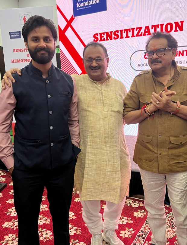 Dr. Shivam Mishra with dignitaries advocating yoga at a healthcare event