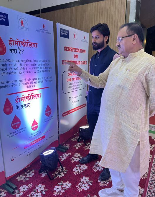 Dr. Shivam Mishra greeting Union Minister Prof SP Singh Baghel