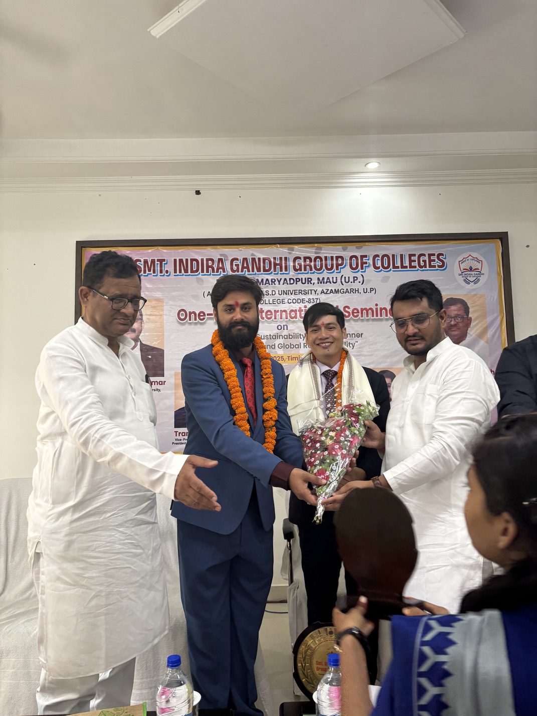 Audience listening attentively at Smt. Indira Gandhi PG College event