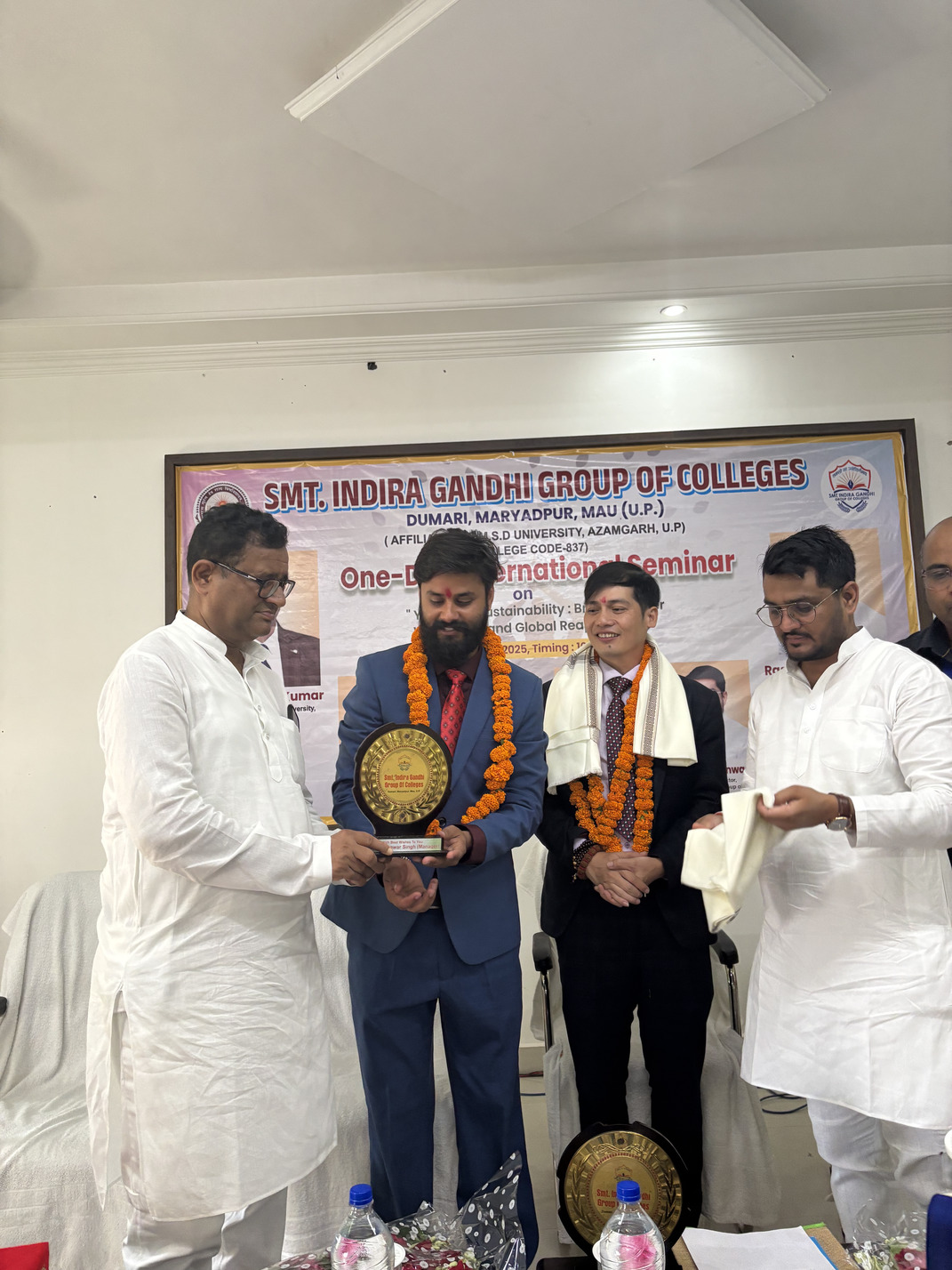 International delegates attending yoga conference alongside Indian scholars