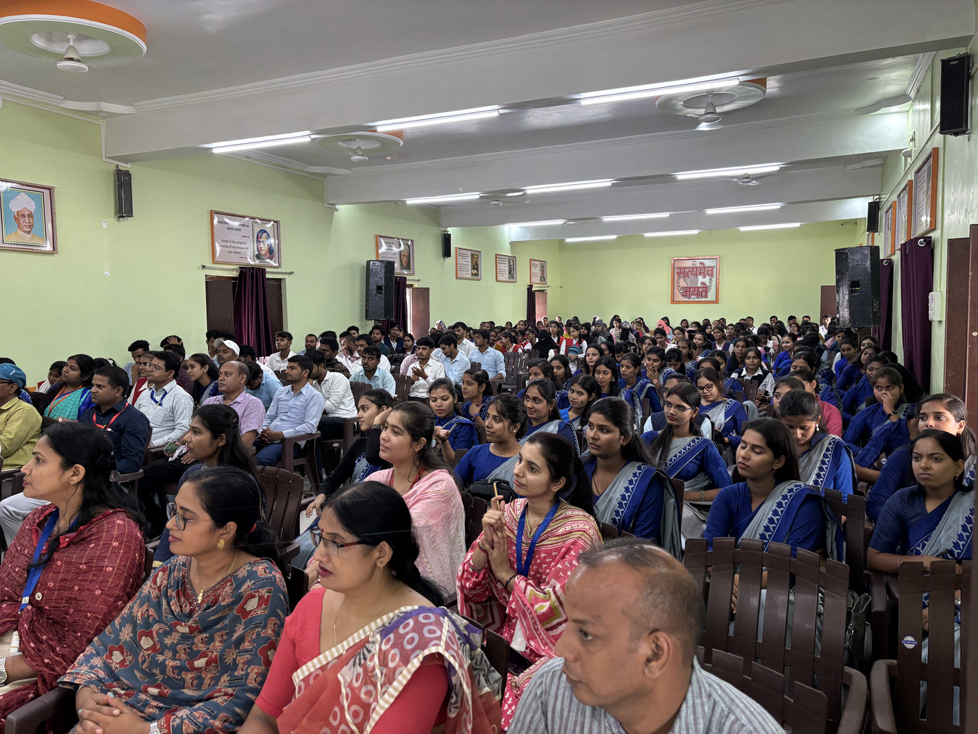 College principal addressing the international yoga conference