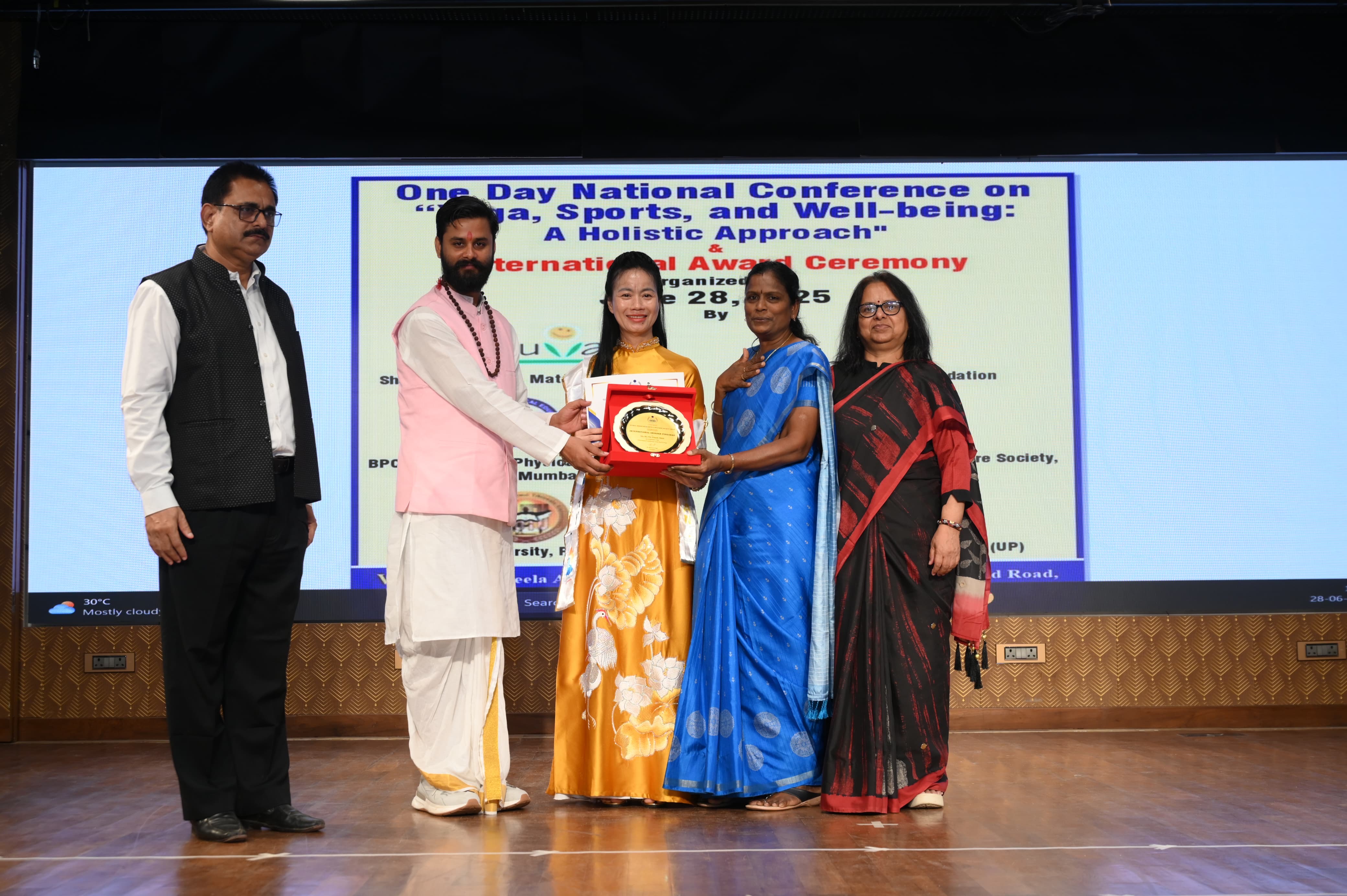 Dr. Shivam Mishra with Mrs. Minh Linh and Dr. Manmath Gharote in Mumbai